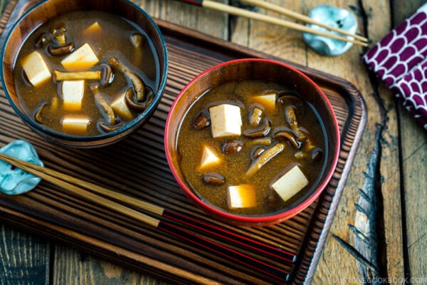 Japanese wooden bowls containing Nameko Mushroom Miso Soup.